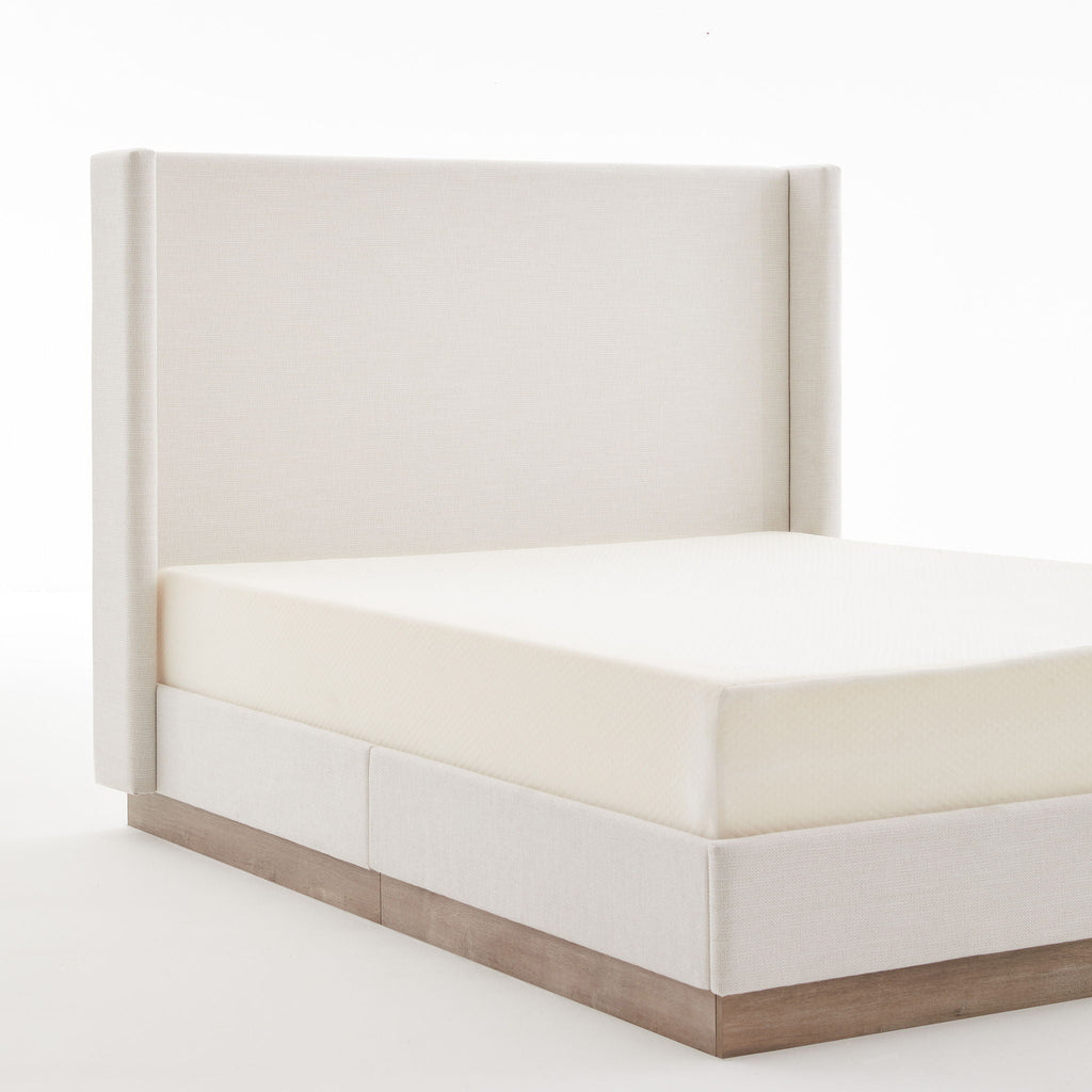 Hosford Minimalist Upholstered Wingback Bed With Rustic Wood Base