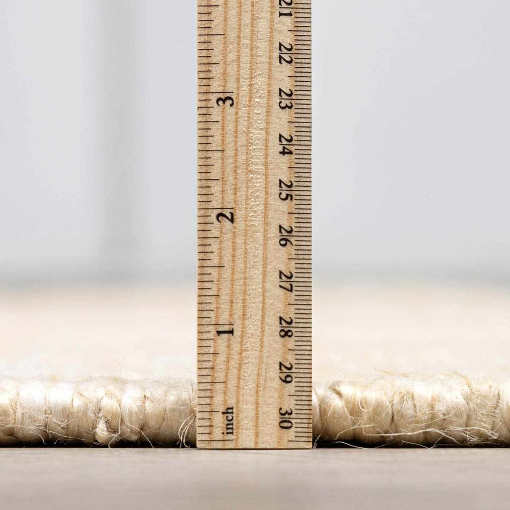 Iantha Handmade Ivory Jute Rug With Custom Shape And Fringe