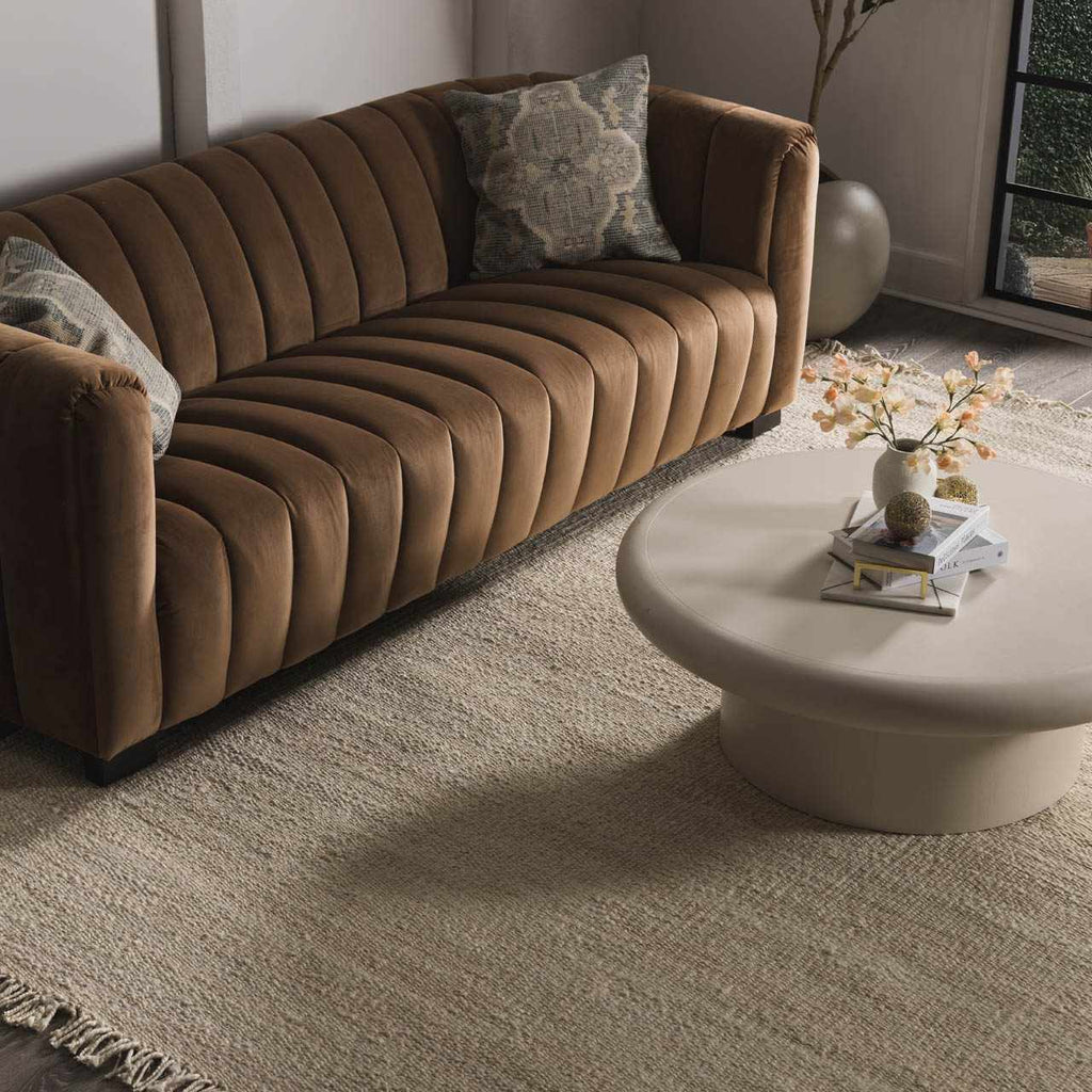 Iantha Handmade Ivory Jute Rug With Custom Shape And Fringe