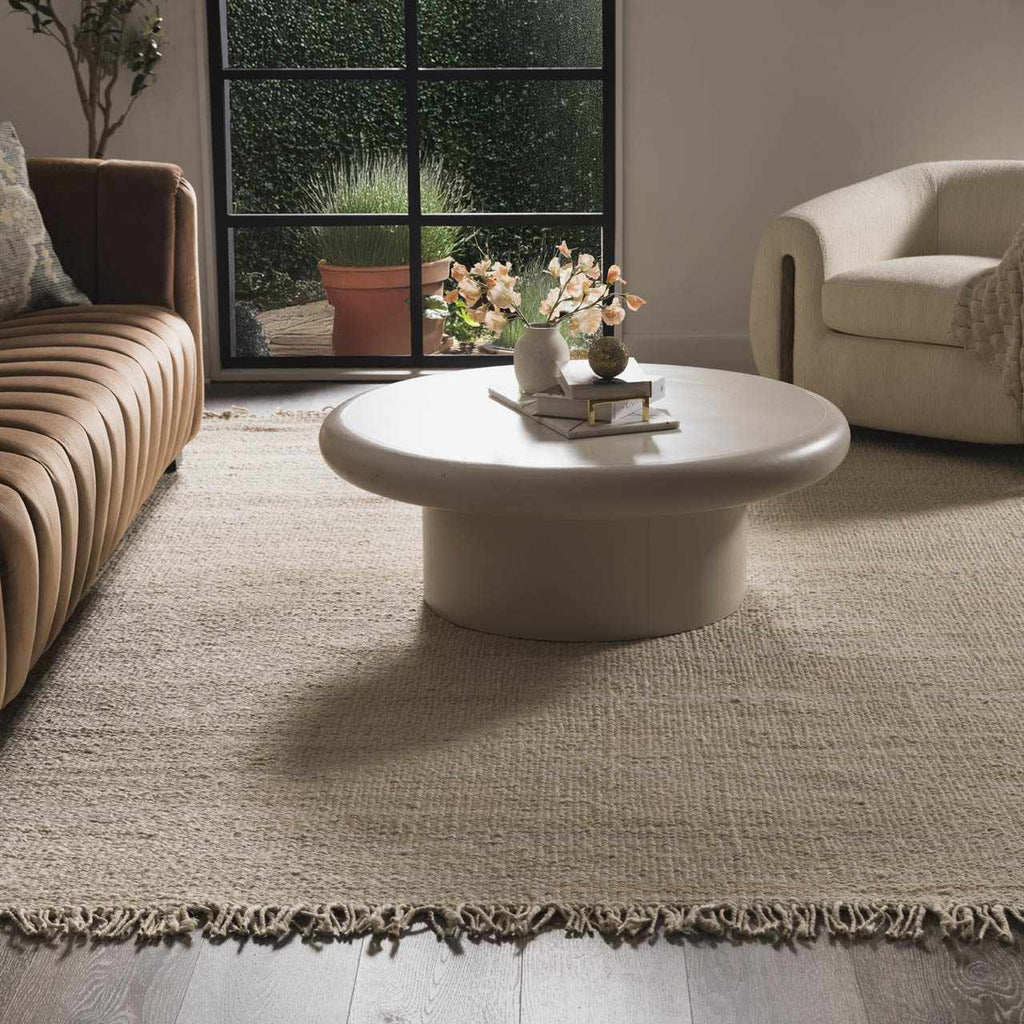 Iantha Handmade Ivory Jute Rug With Custom Shape And Fringe