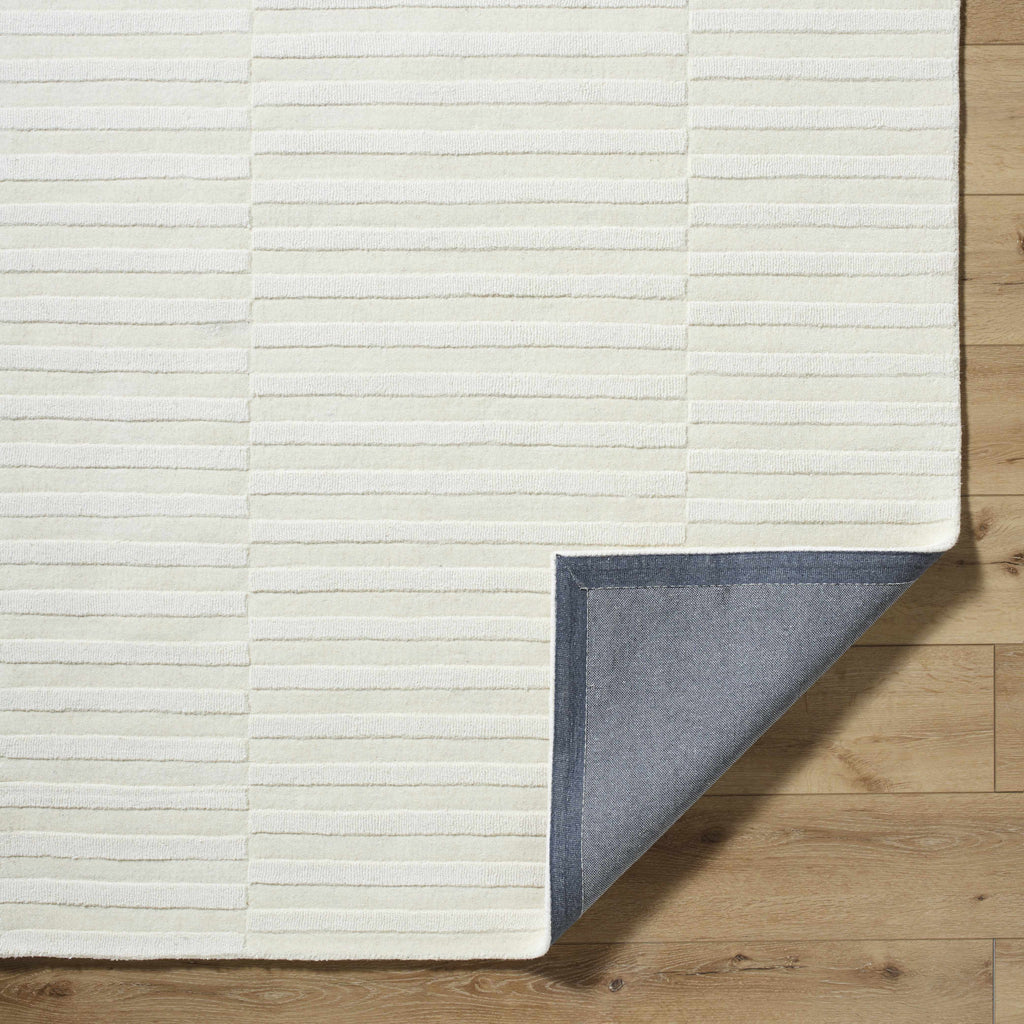 Aelius Hand Loomed Pure Wool Rug In Soft Cream Hues