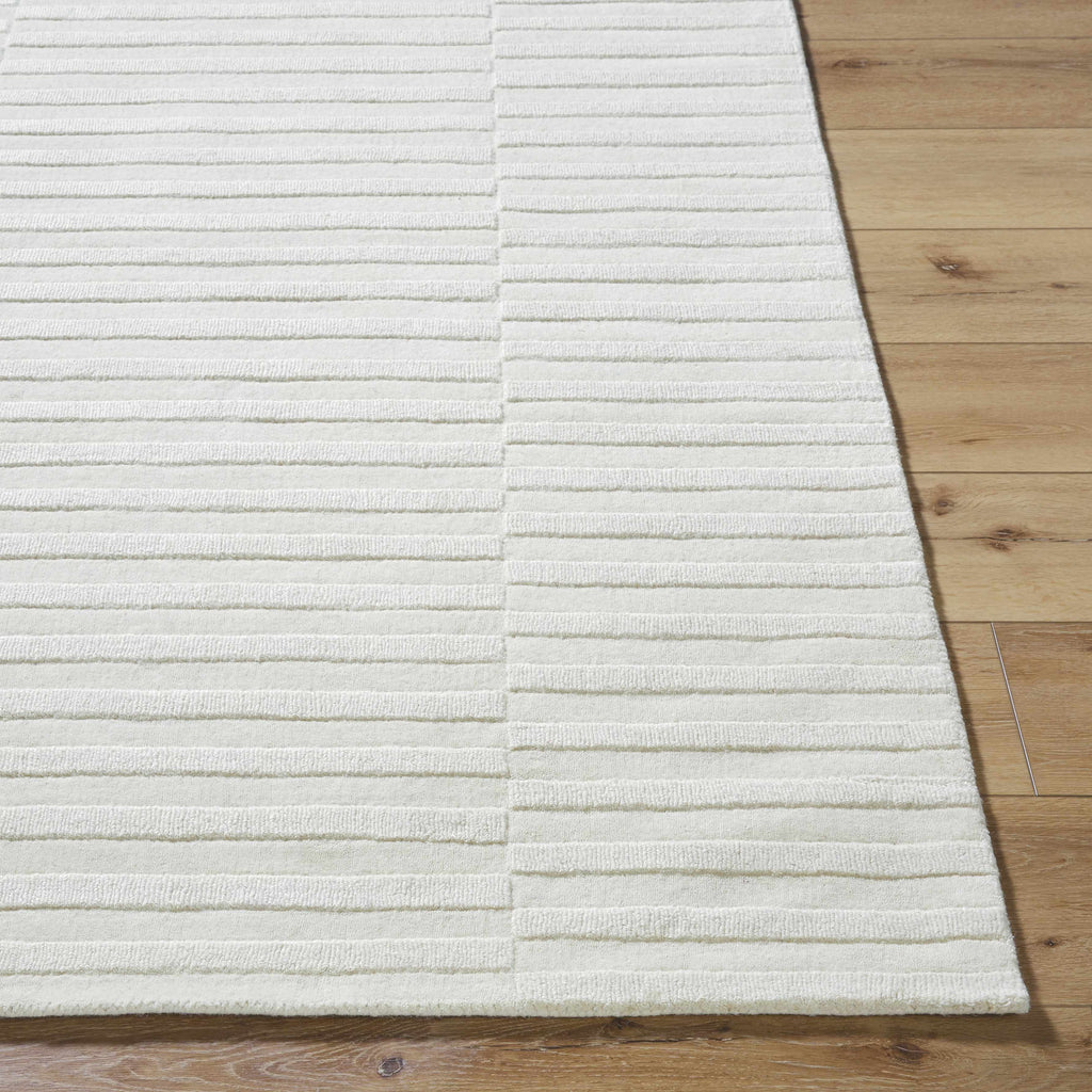 Aelius Hand Loomed Pure Wool Rug In Soft Cream Hues