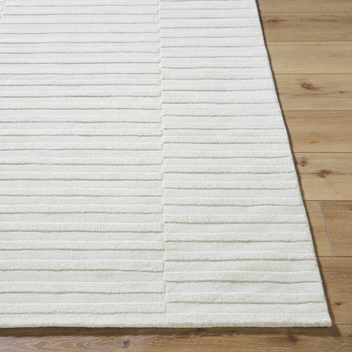 Aelius Hand Loomed Pure Wool Rug In Soft Cream Hues