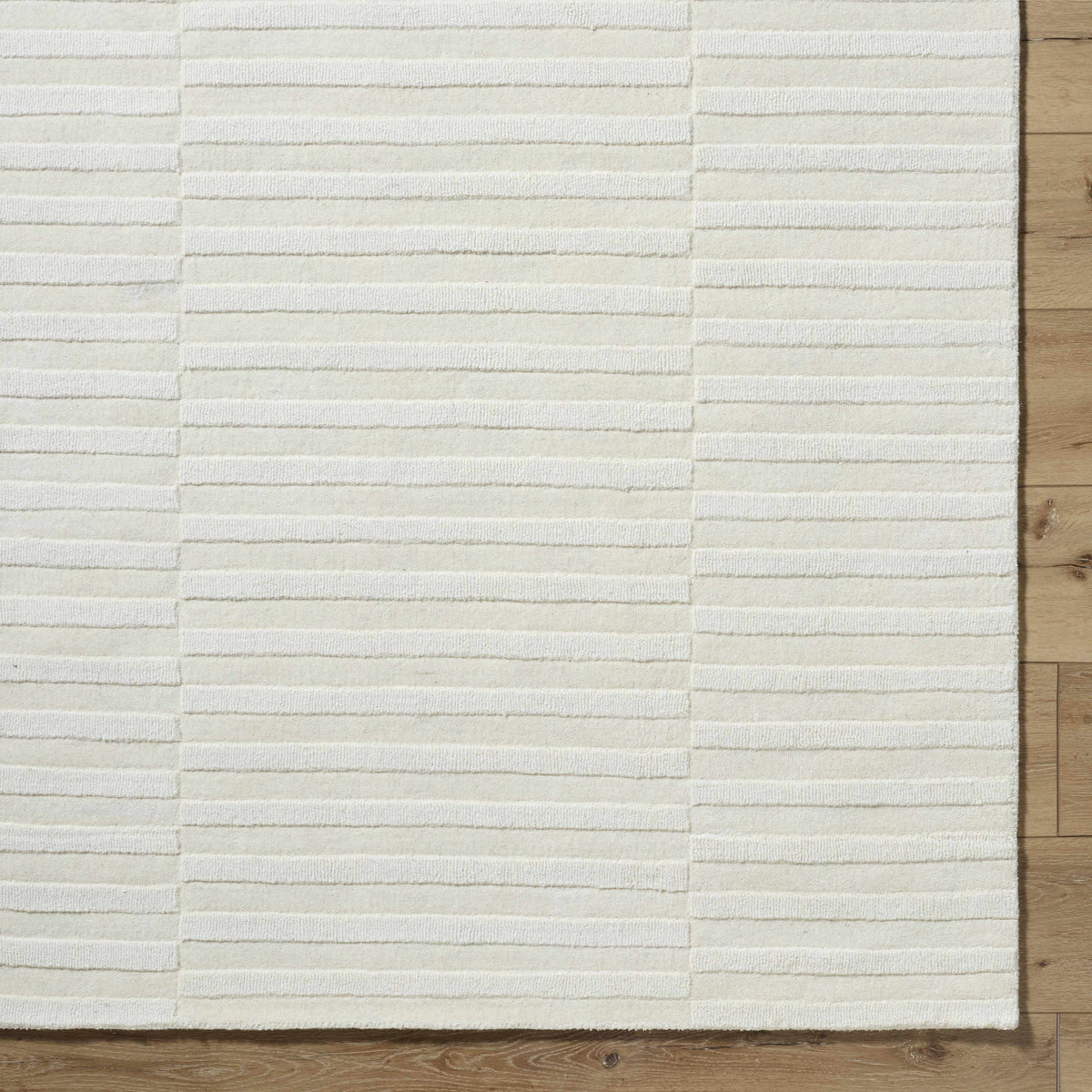 Aelius Hand Loomed Pure Wool Rug In Soft Cream Hues