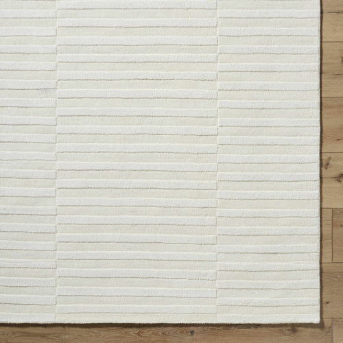 Aelius Hand Loomed Pure Wool Rug In Soft Cream Hues
