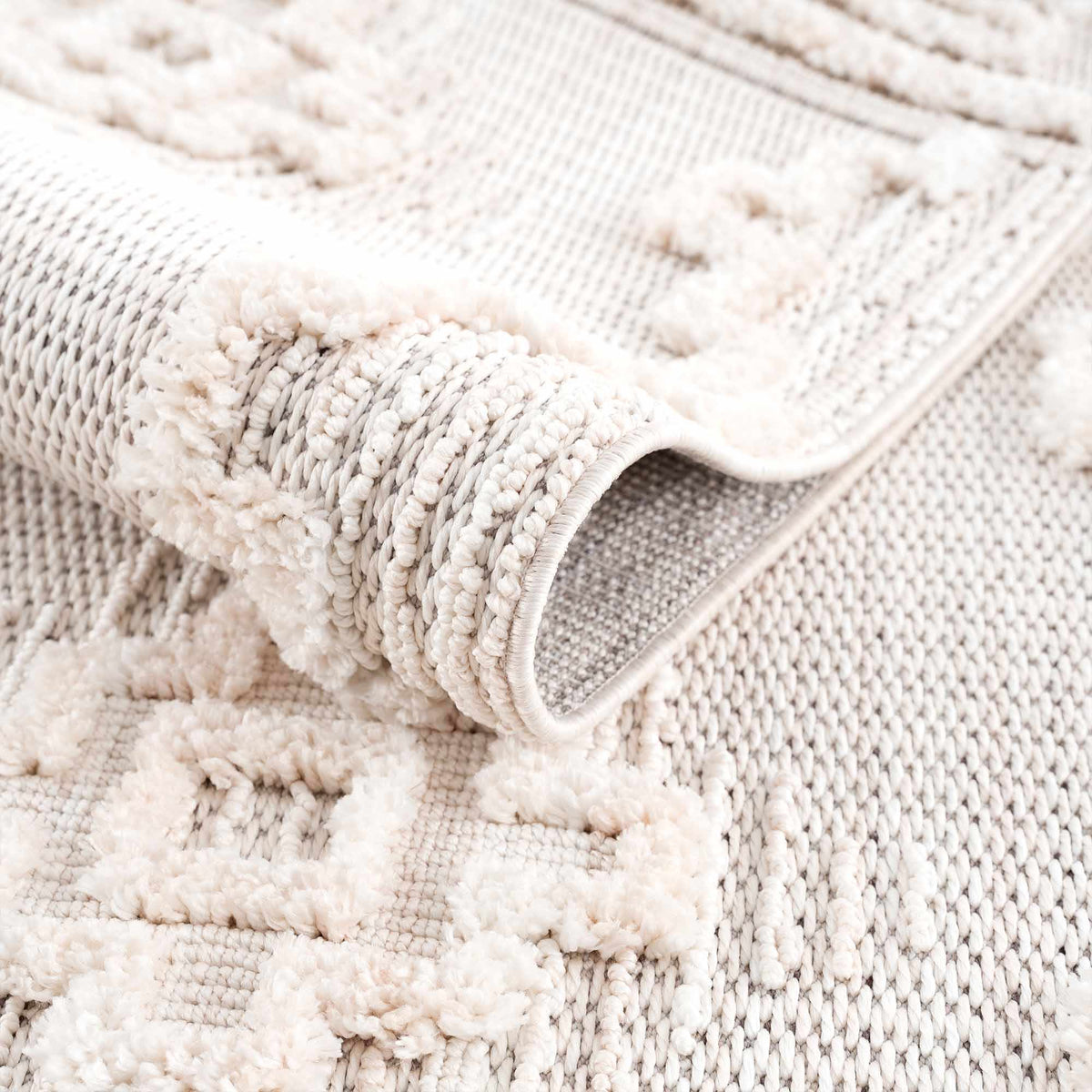 Rosales High Low Pile Elegant Soft Cream Handcrafted Rug