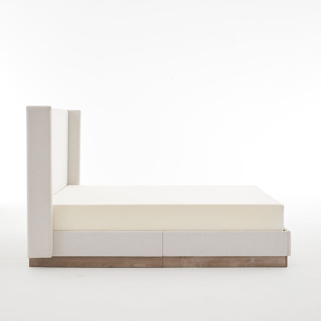 Hosford Minimalist Upholstered Wingback Bed With Rustic Wood Base